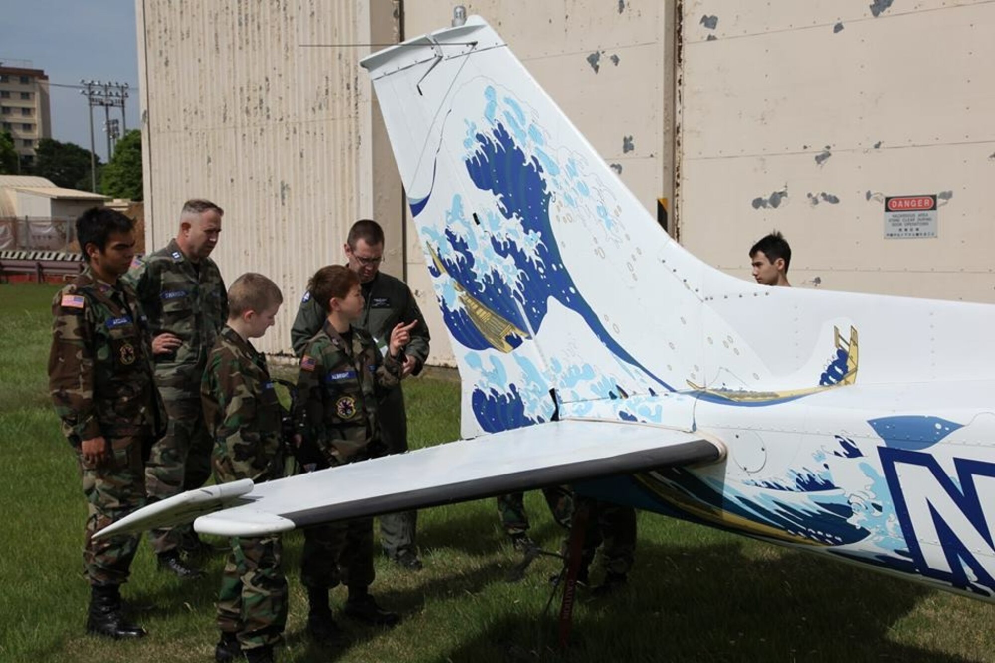 Cadets discuss aircraft controls during an aerospace science lesson during the Far East Conference May 23, 2015 at Yokota Air Base, Japan. Cadets from Kadena Air Base and Yokota Air Base participated in the conference. (Courtesy photo)