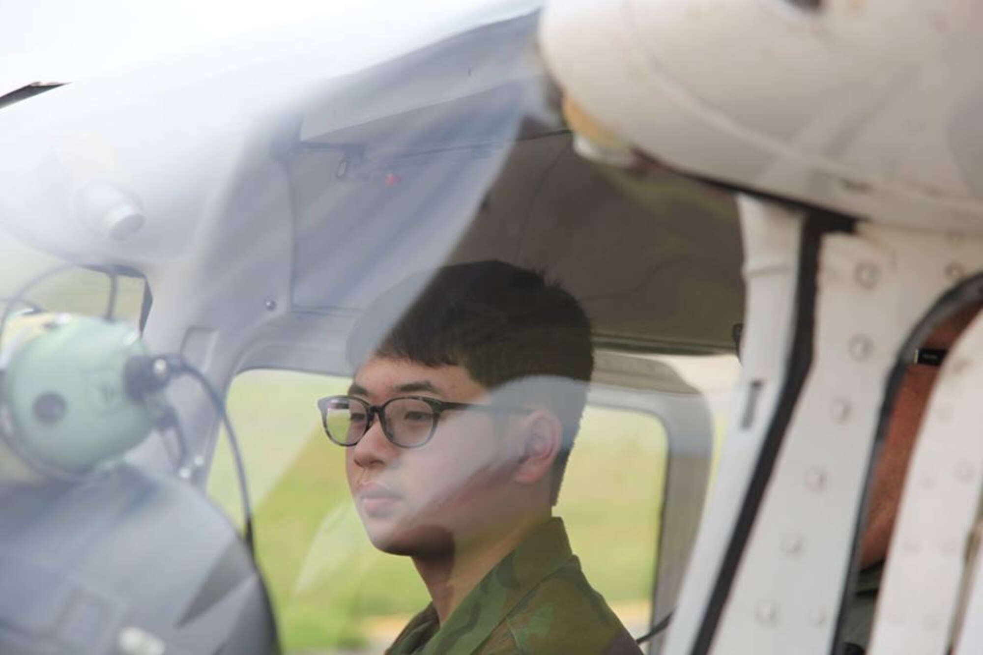 Cadet Airman Basic Jason Pho conducts preflight checks in a Cessna 172 before his orientation flight May 23, 2015 at Yokota Air Base, Japan. Cadets from Kadena Air Base and Yokota Air Base participated in the conference. (Courtesy photo)