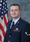 Airman 1st Class Benjamin Bugenig, 9th Reconnaissance Wing Public Affairs, poses for an official photo, December 1, 2014 at Beale Air Force Base, California (U.S. Air Force photo by Robert Scott/Released)