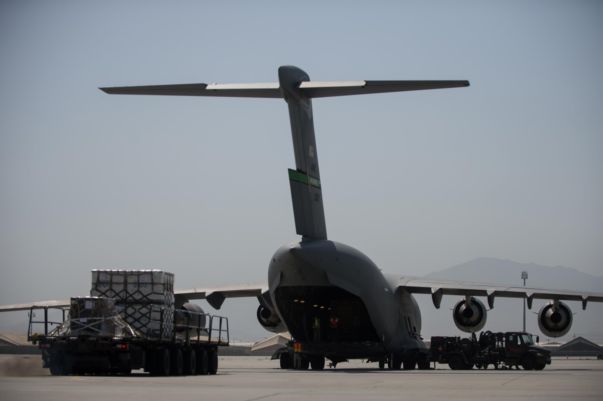 A U.S. Air Force C-17 Globemaster III aircraft is prepared to be loaded with cargo at Bagram Airfield, Afghanistan, June 19, 2015. USAF cargo aircraft have transported 23,100 short tons of cargo throughout Afghanistan this year (U.S. Air Force photo by Tech. Sgt. Joseph Swafford/Released)