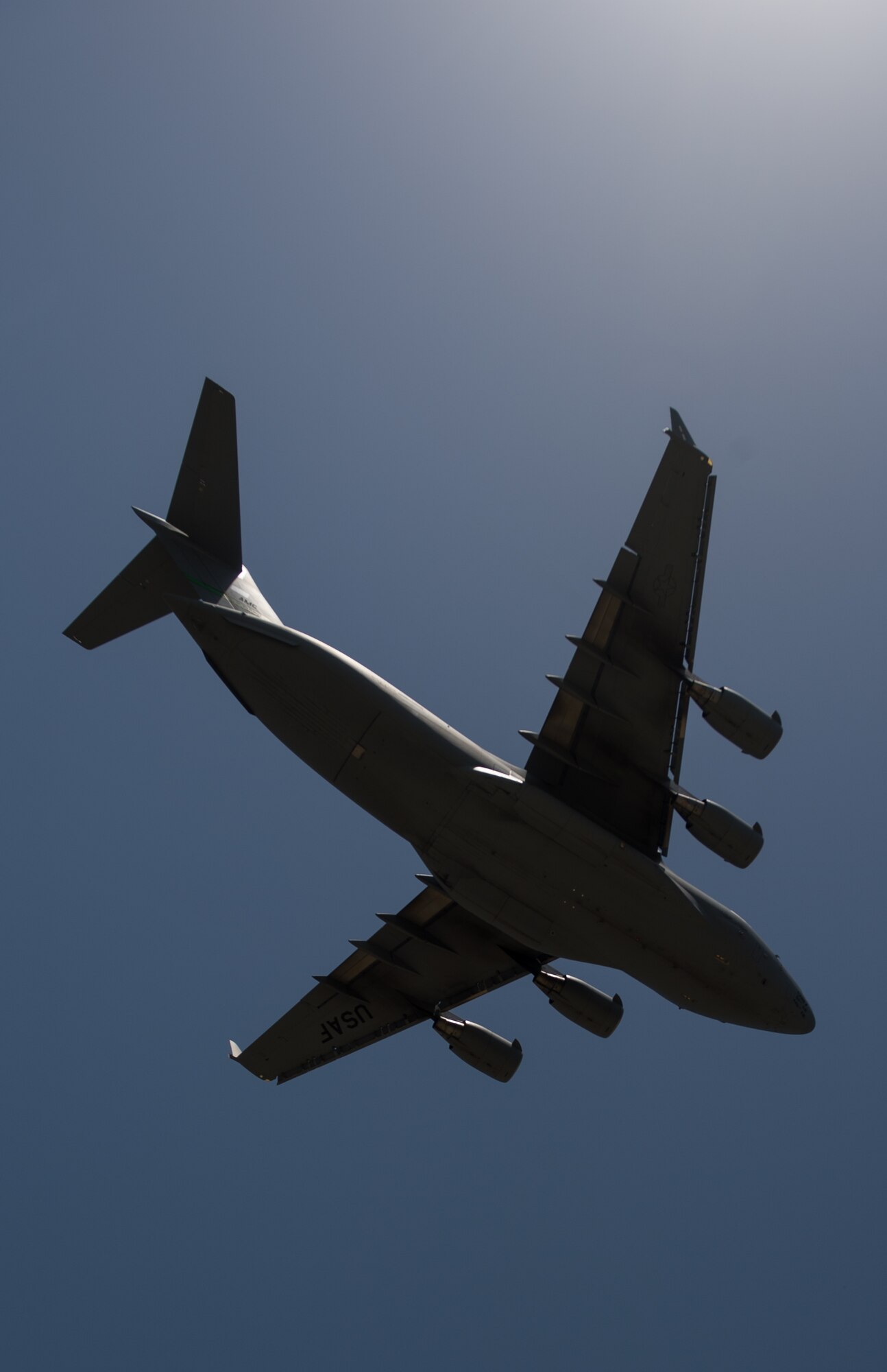 A U.S. Air Force C-17 Globemaster III aircraft takes off after receiving maintenance from Airman assigned to the 8th Expeditionary Air Mobility Squadron at Bagram Airfield, Afghanistan, June 19, 2015. USAF cargo aircraft have transported 23,100 short tons of cargo throughout Afghanistan this year (U.S. Air Force photo by Tech. Sgt. Joseph Swafford/Released)