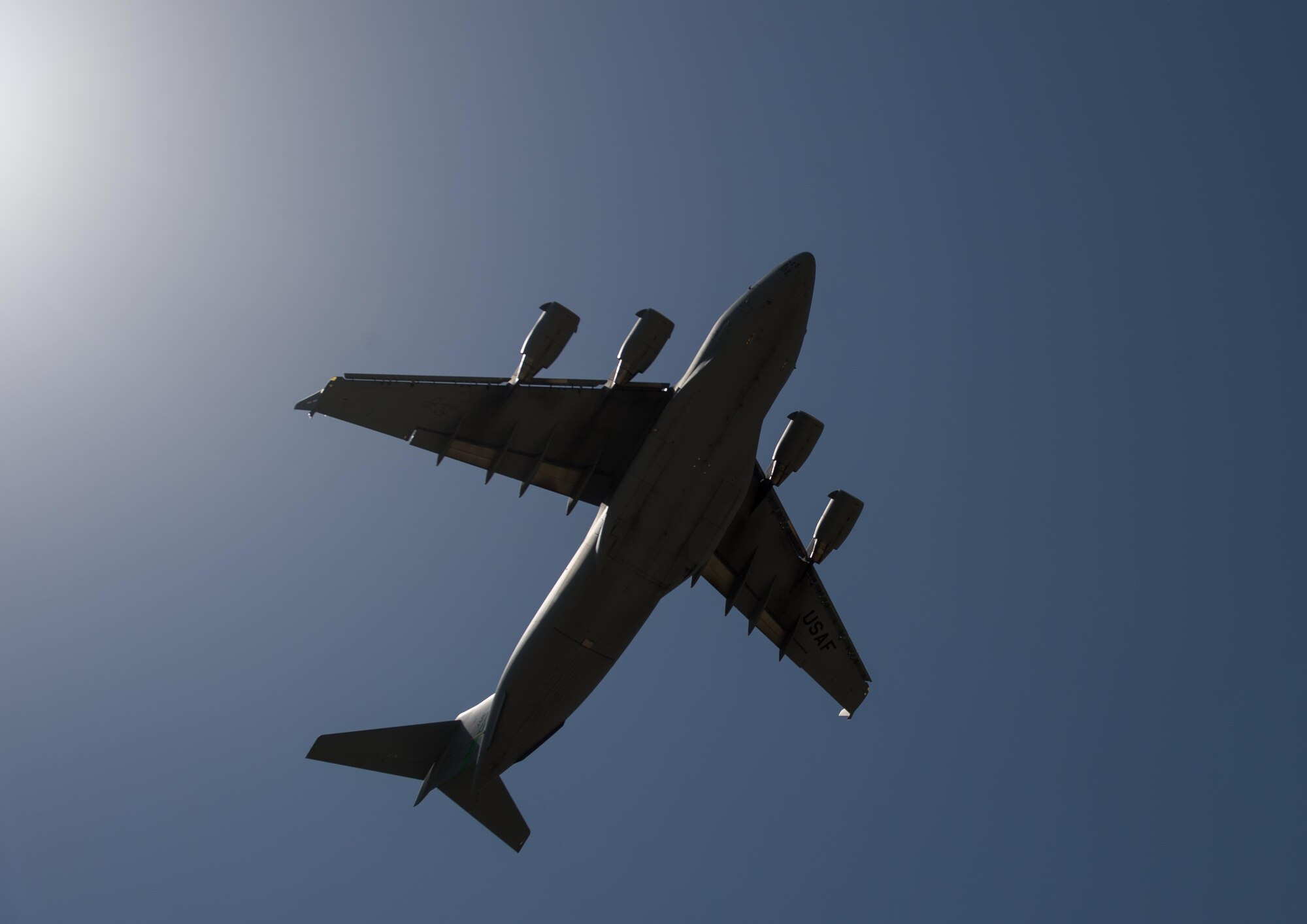 A U.S. Air Force C-17 Globemaster III aircraft takes off after receiving maintenance from Airman assigned to the 8th Expeditionary Air Mobility Squadron at Bagram Airfield, Afghanistan, June 19, 2015. USAF cargo aircraft have transported 23,100 short tons of cargo throughout Afghanistan this year (U.S. Air Force photo by Tech. Sgt. Joseph Swafford/Released)