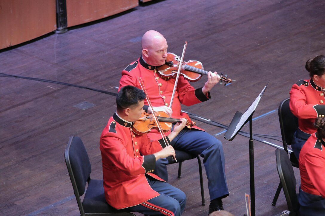 On June 20, 2015, the Marine Chamber Orchestra performed at the Rachel M. Schlesinger Concert Hall in Alexandria, Va. The program included Einojuhani Rautavaara’s An Epitaph for Béla Bartók, Felix Mendelssohn’s Concerto for Violin and Piano in D minor, and Béla Bartók’s Divertimento for String Orchestra. (U.S. Marine Corps photo by Gunnery Sgt. Amanda Simmons/released)