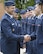 Brig. Gen. Joseph Guastella, the deputy director for requirements (J8), Joint Staff, the Pentagon, greets Joint Specialized Undergraduate Pilot Training Class 15-10 graduates at Vance Air Force Base, Oklahoma, June 12. (U.S. Air Force photo by David Poe)