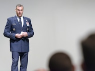 Brig. Gen. Joseph Guastella, the deputy director for requirements (J8), Joint Staff, the Pentagon, speaks at the Joint Specialized Undergraduate Pilot Training Class 15-10 graduation at Vance Air Force Base, Oklahoma, June 12. (U.S. Air Force photo by David Poe)