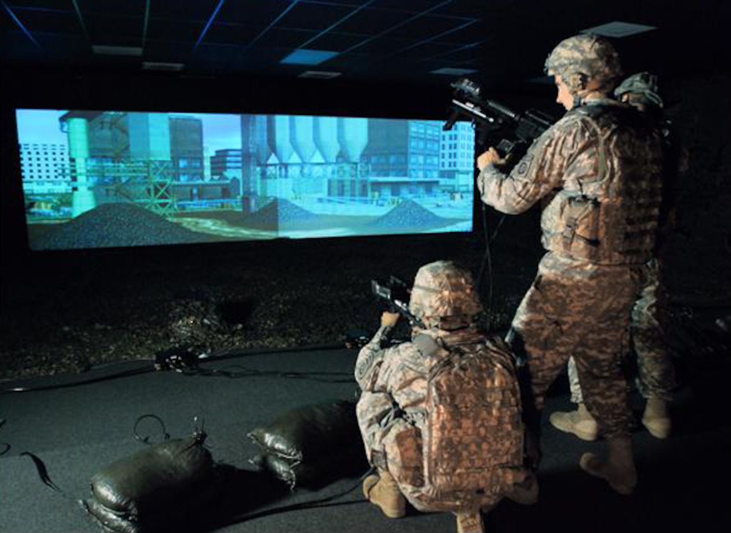 Soldiers simulate real world battle conditions with the Product Manager for Ground Combat Tactical Trainers Engagement Skills Trainer 2000. The EST 2000 will be available for Army National Guard, Reserve and Reserve Officers Training Corps May 2011 until February 2012