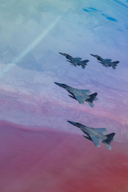 U.S. Air Force F-15C Eagles assigned to the 493rd Fighter Squadron at Royal Air Force Lakenheath, England, fly with Turkish Air Force F-16C Fighting Falcons during Anatolian Eagle 15, June 17, 2015, in Turkey. The two-week flying training exercise involved U.S. Air Forces in Europe and Air Forces Africa units and multiple NATO partners. (Courtesy photo/Master Sgt. Nick Hodge)