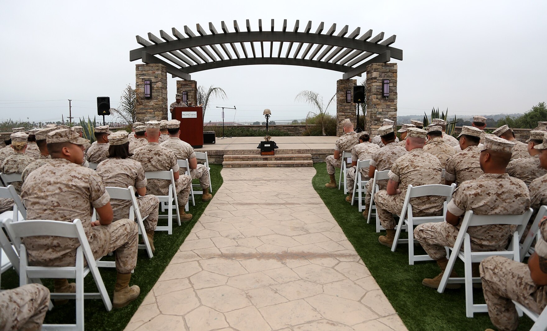 Service members of 1st Medical Battalion, 1st Marine Logistics Group, and distinguished guests, wait for the 117th Hospital Corps Birthday ceremony to begin aboard Camp Pendleton, Calif., June 17, 2015. The Hospital Corps came into existence as an organized unit of the medical department under the provision of an act of congress approved June 17, 1898. The hospital corpsmen work in a wide variety of capacities and locations, including shore establishments such as naval hospitals and clinics, aboard ships, and as the primary medical caregivers for Sailors and Marines while underway and forward deployed. (U.S. Marine Corps photo by Sgt. Laura Gauna/ Released)