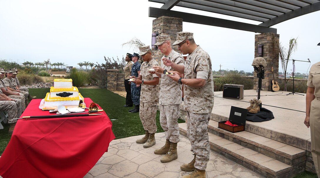 Chief Hospital Corpsman James Boening, center, the oldest corpsman present, Hospital Corpsman Justin Sontoyo, left, the youngest corpsman present, and 1st Medical Battalion’s Command Master Chief Edgar M. Santiago, right, eat a piece of cake during the 117th Hospital Corps Birthday ceremony aboard Camp Pendleton, Calif., June 17, 2015. It is naval tradition for the third piece of cake to be passed from the oldest corpsman present to the youngest and for the first piece of cake to be presented to the guest of honor. The Hospital Corps came into existence as an organized unit of the medical department under the provision of an act of congress approved June 17, 1898. The hospital corpsmen work in a wide variety of capacities and locations, including shore establishments such as naval hospitals and clinics, aboard ships, and as the primary medical caregivers for Sailors and Marines while underway and forward deployed. (U.S. Marine Corps photo by Sgt. Laura Gauna/ Released)