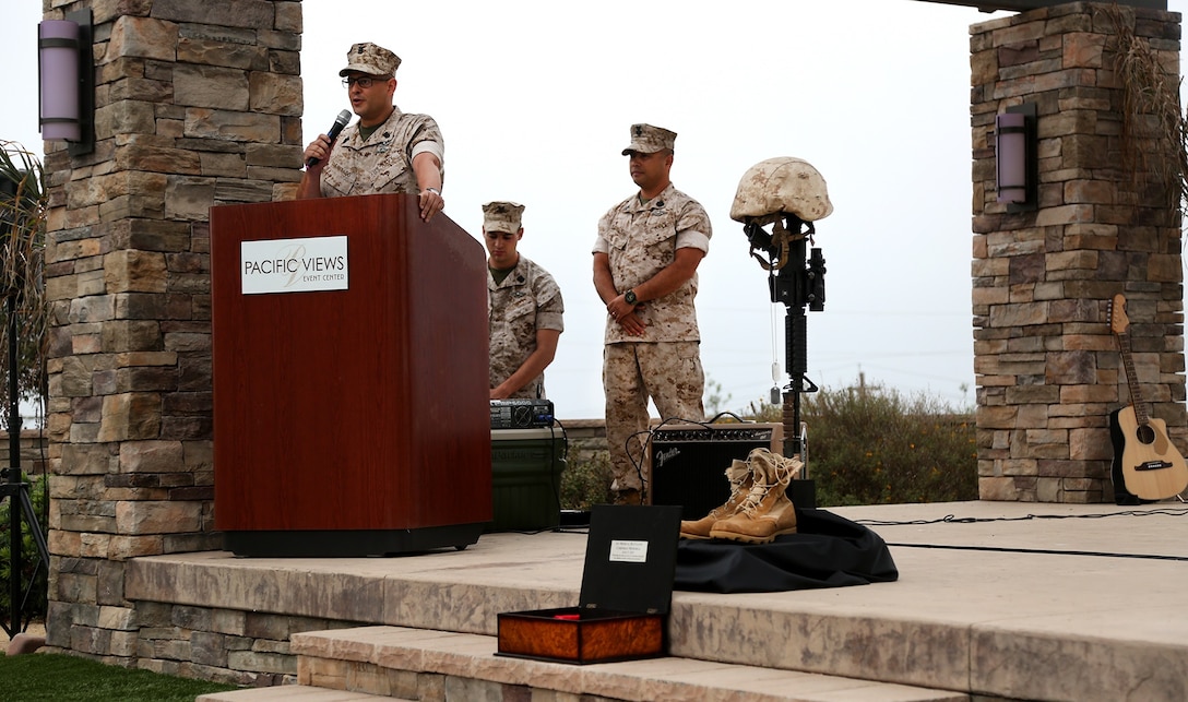 Command Master Chief Edgar M. Santiago, 1st Medical Battalion, 1st Marine Logistics Group, speaks to Sailors and Marines during the 117th Hospital Corps Birthday ceremony aboard Camp Pendleton, Calif., June 17, 2015. The Hospital Corps came into existence as an organized unit of the medical department under the provision of an act of congress approved June 17, 1898. The hospital corpsmen work in a wide variety of capacities and locations, including shore establishments such as naval hospitals and clinics, aboard ships, and as the primary medical caregivers for Sailors and Marines while underway and forward deployed. (U.S. Marine Corps photo by Sgt. Laura Gauna/ Released)