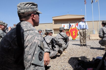 Army Spc. Michael O'Keefe (left), Army Spc. Nicole Toothman (second from
left), and Army Spc. Christina Watson (center), along with other Soldiers of
the 116th Cavalry Brigade, listen as Secretary of Defense Robert M. Gates
(right) discusses current events and policy changes with troops serving in
support of Operation New Dawn under United States Division--Center at Camp
Liberty in Baghdad, Iraq, April 7, 2011.