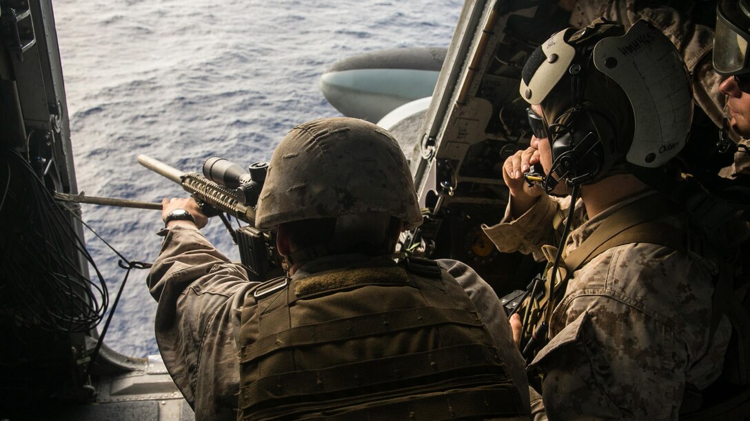 U.S. Marines with Weapons Company, Battalion Landing Team 3rd Battalion, 1st Marine Regiment, 15th Marine Expeditionary Unit, practice aerial sniping from a CH-53E Super Stallion. The Marines practiced shooting at floating targets in order to improve their marksmanship and become comfortable firing from the air. The 15th MEU is embarked on the Essex Amphibious Ready Group and deployed to maintain regional security in the U.S. 5th Fleet area of operations.