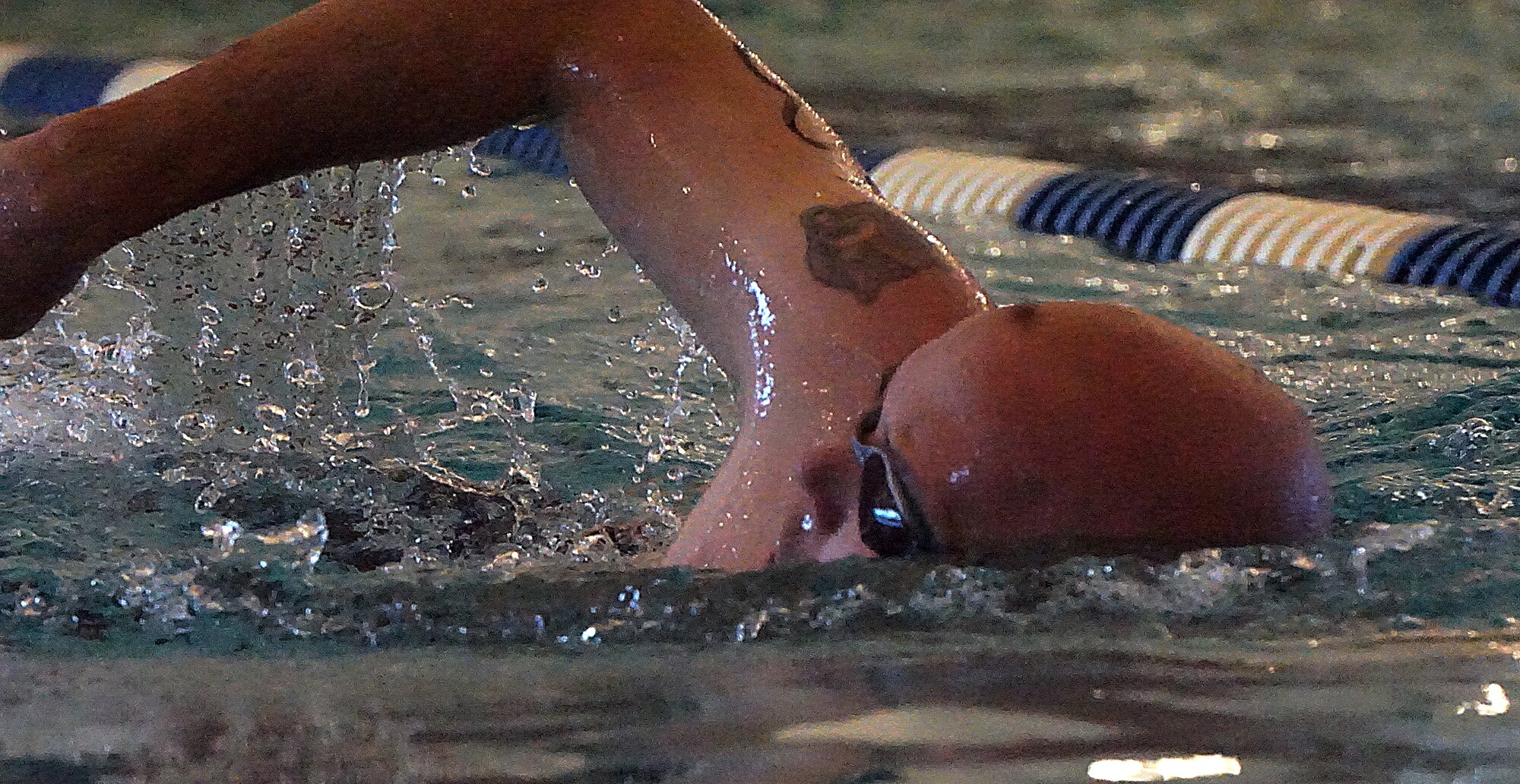 Dave Sorrels swims 10 laps in the F.E. Warren Air Force Base, Wyo., Aquatics Center during the 90th Force Support Squadron mini-triathlon June 20, 2015. (U.S. Air Force photo by Airman 1st Class Brandon Valle)
