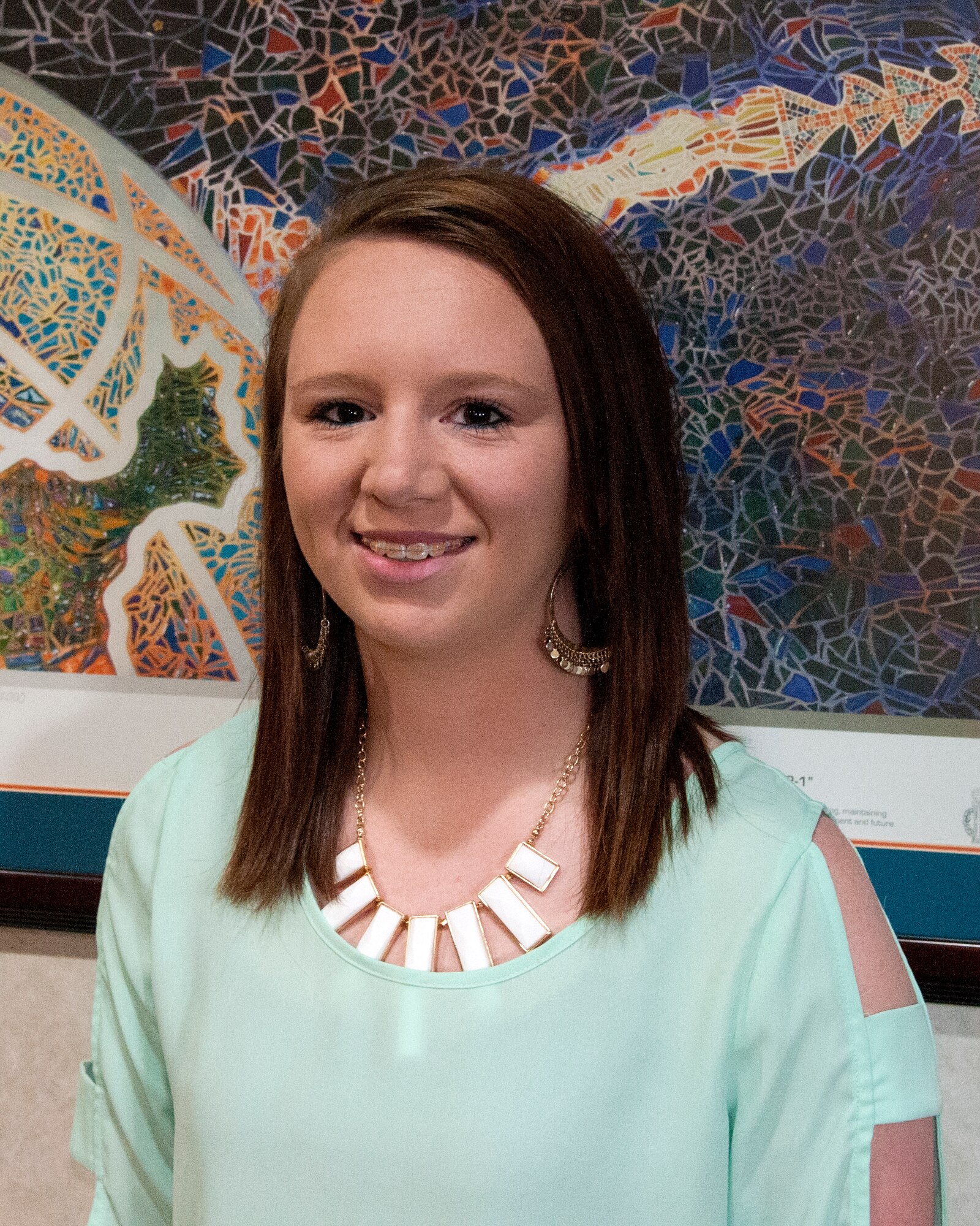 Allison Gerstner, 90th Missile Maintenance Squadron key spouse, poses in the 90th Missile Wing Headquarters on F.E. Warren Air Force Base, Wyo., June 12, 2015. Gerstner, who also works as a 90th Force Support Squadron Child Development Center caregiver, has been key spouse for the 90th MMXS since early 2014. (U.S. Air Force photo by Senior Airman Jason Wiese)