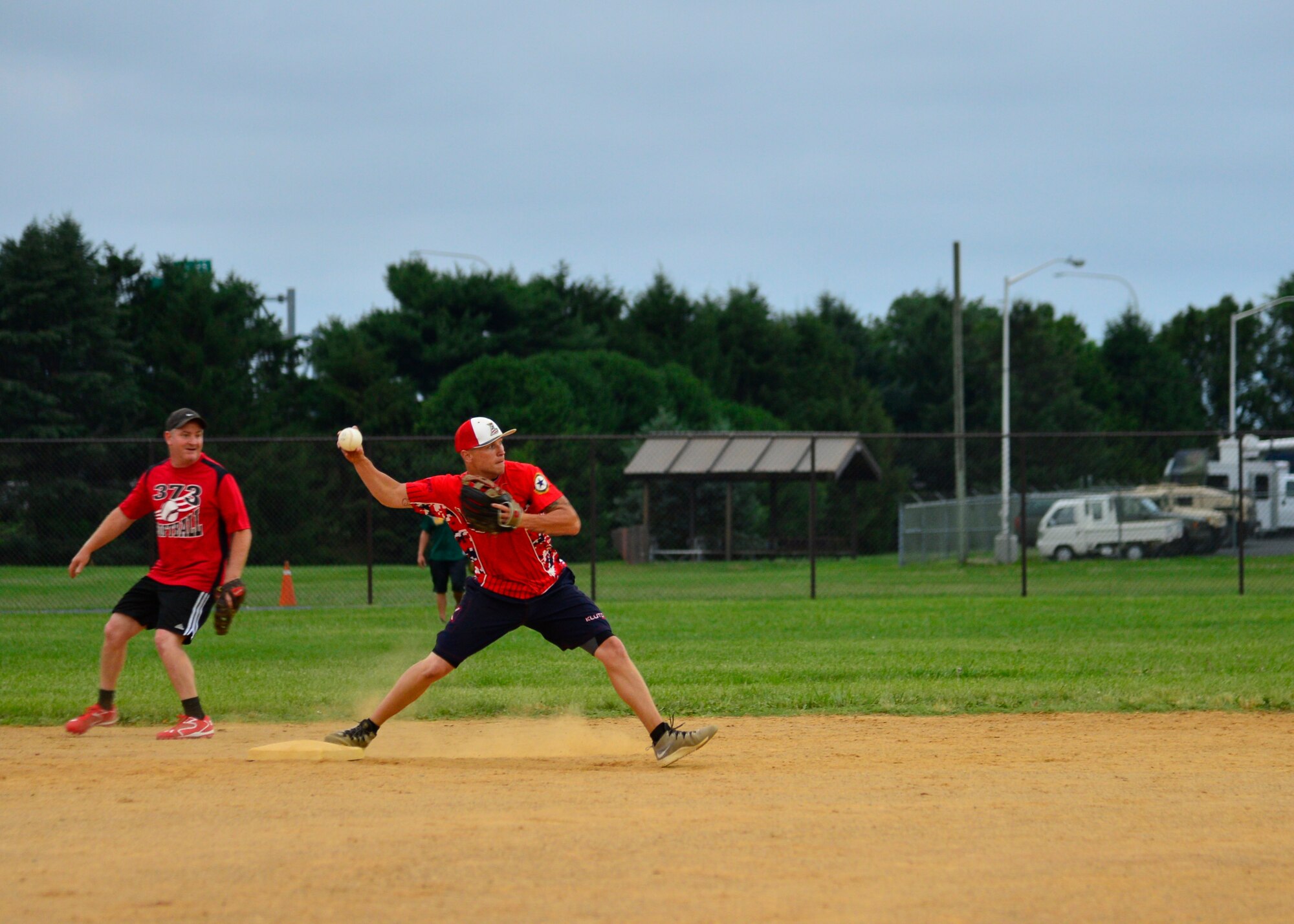 James Keener, 373d Training Squadron, turns a double play during an intramural softball game against the 436th Security Forces Squadron June 17, 2015, at the softball field on Dover Air Force Base, Del. The 373d TRS defeated the 436th SFS 11-6. (U.S. Air Force photo/Airman 1st Class William Johnson)
