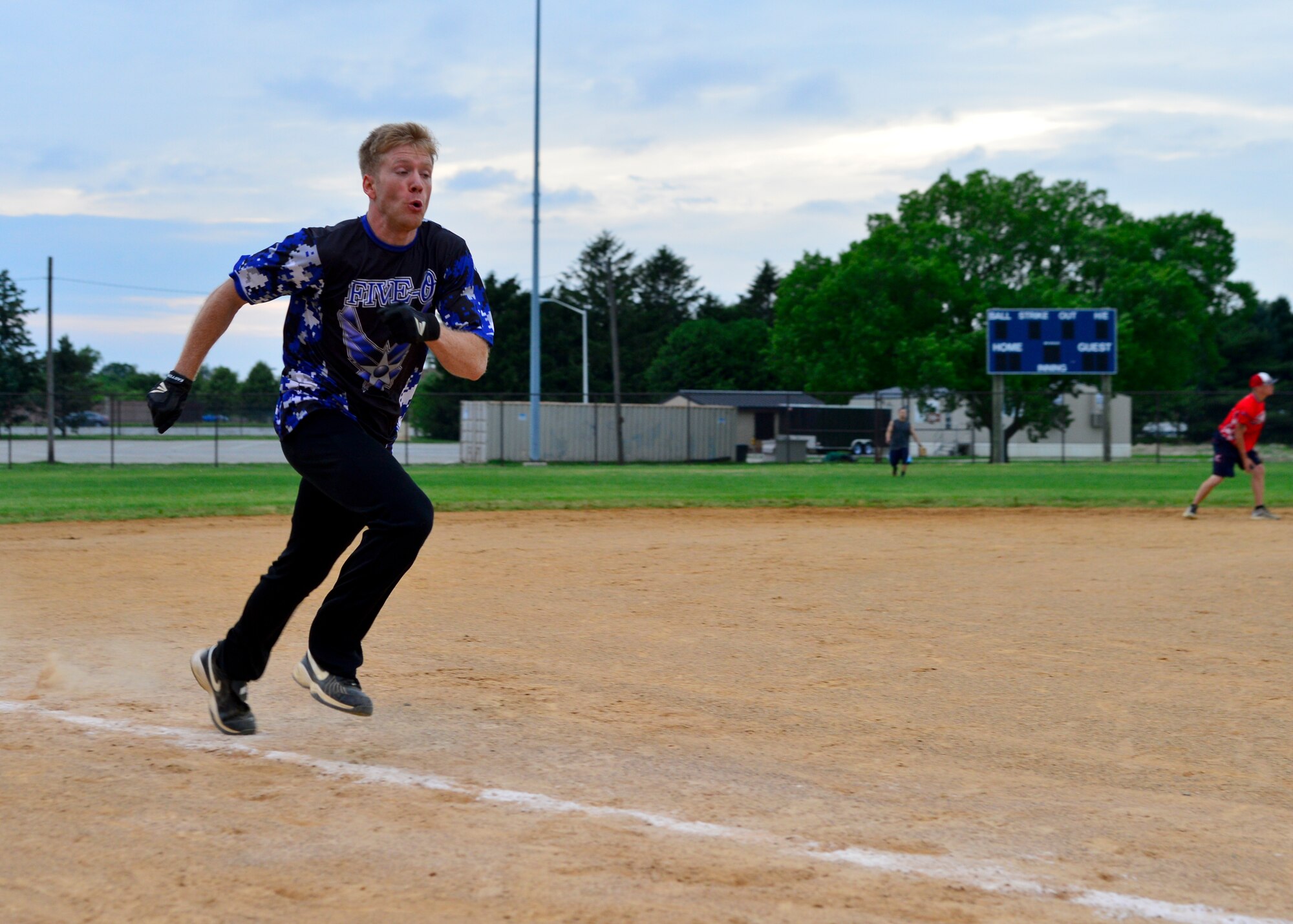 Jordan Hucks, 436th Security Forces Squadron, sprints towards home plate in an intramural softball game June 17, 2015, at the softball field on Dover Air Force Base, Del. The 436th SFS was defeated in rematch of last year’s championship game against the 373d Training Squadron, 11-6. (U.S. Air Force photo/Airman 1st Class William Johnson)