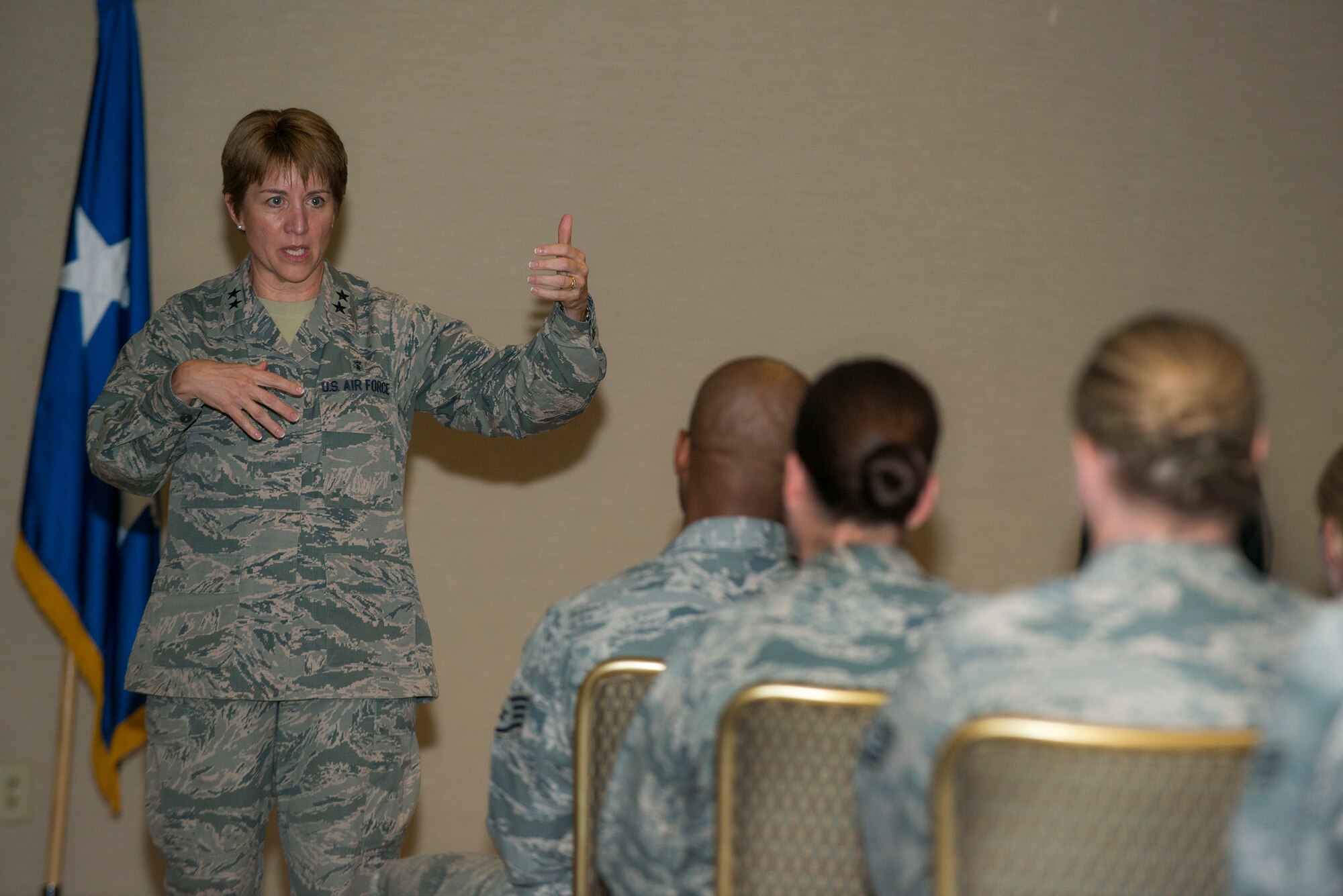 Maj. Gen. Dorothy A. Hogg, Assistant Air Force Surgeon General, Medical Force Development and Chief of the Nurse Corps, speaks to the 23d Medical Group during an all-call June 18, 2015, at Moody Air Force Base, Ga. Hogg spoke about further improvements to the clinic after touring of the 23d MDG. (U.S. Air Force photo By Airman 1st Class Kathleen D. Bryant/Released) 