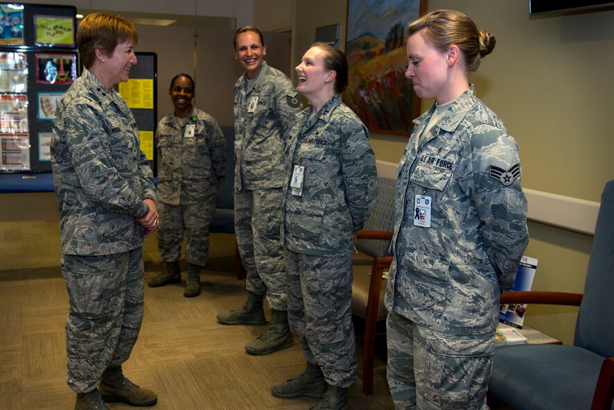 Airmen from the 23d Medical Group speak to Maj. Gen. Dorothy A. Hogg, left, Assistant Air Force Surgeon General, Medical Force Development and Chief of the Nurse Corps, during a tour June 18, 2015, at Moody Air Force Base, Ga. An Airman from each clinic was selected to explain their job to Hogg as she toured the 23d MDG. (U.S. Air Force photo By Airman 1st Class Kathleen D. Bryant/Released)