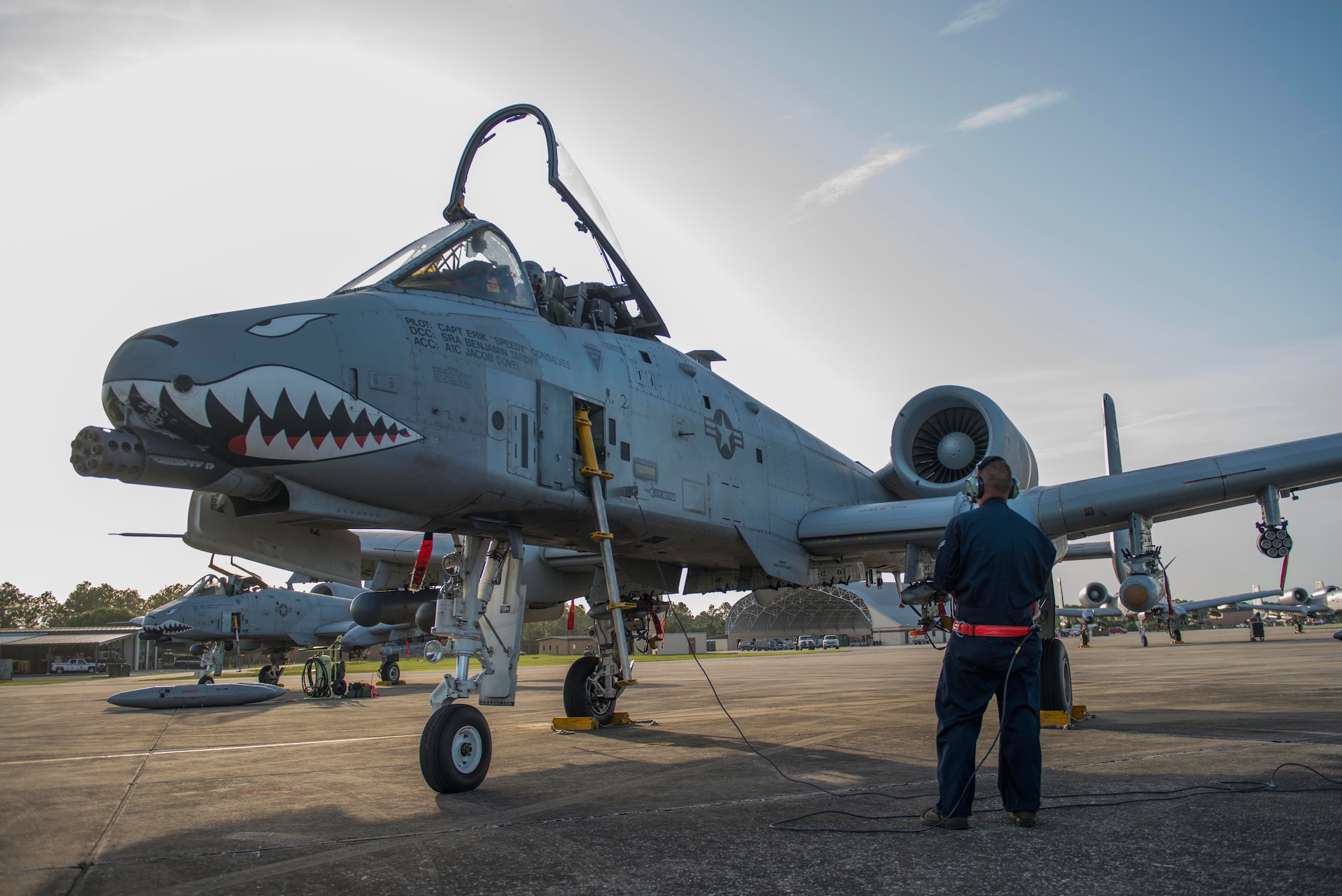 U.S. Air Force Airman 1st Class Jacob Dovel, 23d Aircraft Maintenance Squadron crew chief, coordinates with Capt. Bass Farmer, 75th Fighter Squadron A-10C Thunderbolt II pilot, on pre-flight checks before takeoff during Exercise DRAGON STRIKE June 11, 2015, at Avon Park Air Force Range, Fla. The 23d AMXS provided maintenance for all ten of Moody Air Force Base’s A-10s participating in joint terminal attack controller exercises. (U.S. Air Force photo by Airman 1st Class Dillian Bamman/Released)
