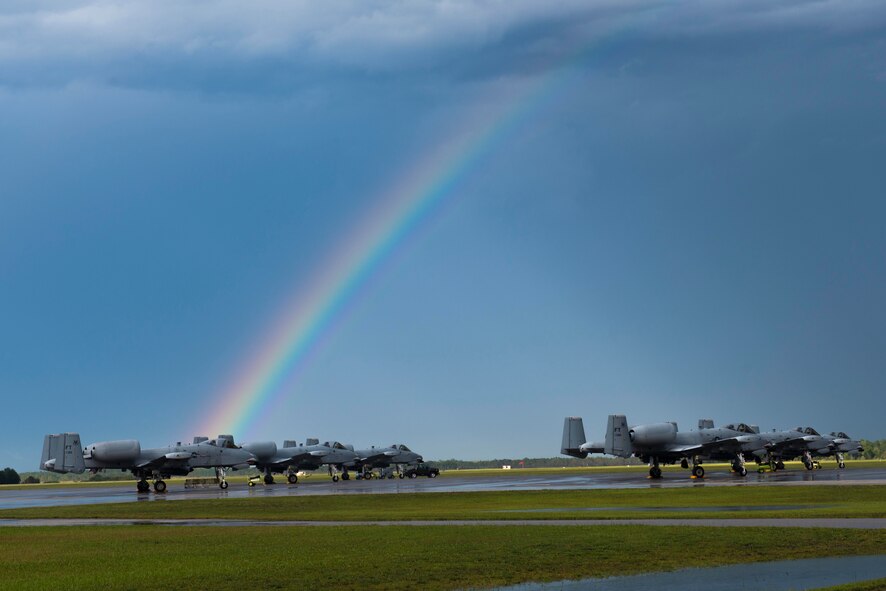 A-10C Thunderbolt IIs rest on the flight line after a rainstorm during Exercise DRAGON STRIKE June 10, 2015, at Avon Park Air Force Range, Fla. Moody sent ten A-10s to Avon Park to perform close air support for joint terminal attack controller exercises. (U.S. Air Force photo by Airman 1st Class Dillian Bamman/Released)