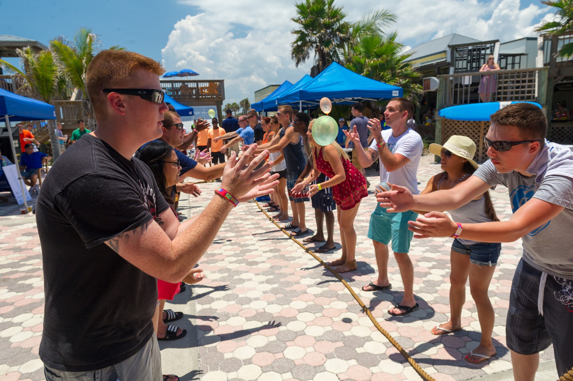 More than 400 service members attended the Junior Enlisted Appreciation Picnic, June 19, at the Beach House at Patrick Air Force Base, Florida. The Patrick AFB Top 3 and Military Affairs Council hosted the event which was open to all military services E-6 and below. (U.S. Air Force photo/Cory Long) (Released) 