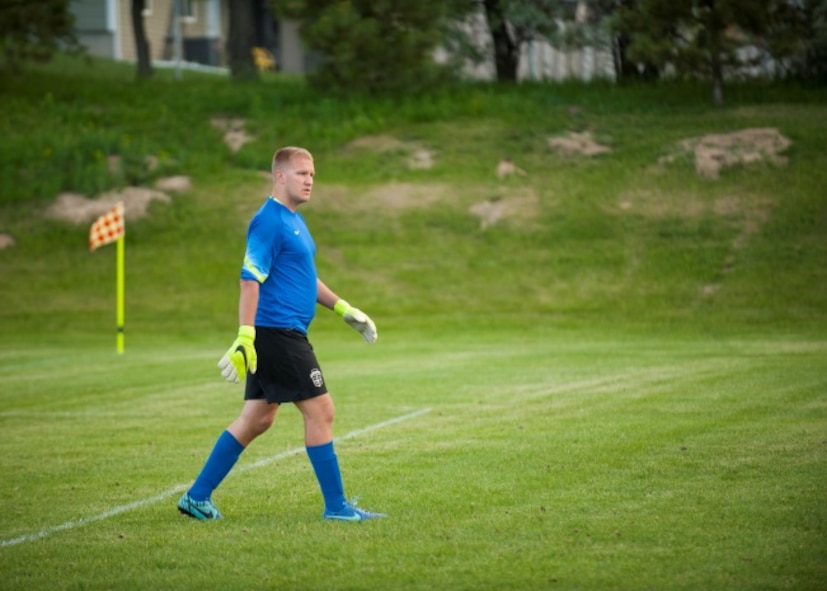 Senior Airman Ryan Praleikas, an aerospace medical technician with the 5th Medical Group, waits for another attempt to stop a goal at the Optimist Soccer Complex, Minot, N.D., June 17, 2015. Praleikas said he started playing goal keeper at a young age and eventually went on to play the same position for the Air Force Men’s Soccer team. (U.S. Air Force photo/Airman 1st Class Christian Sullivan)