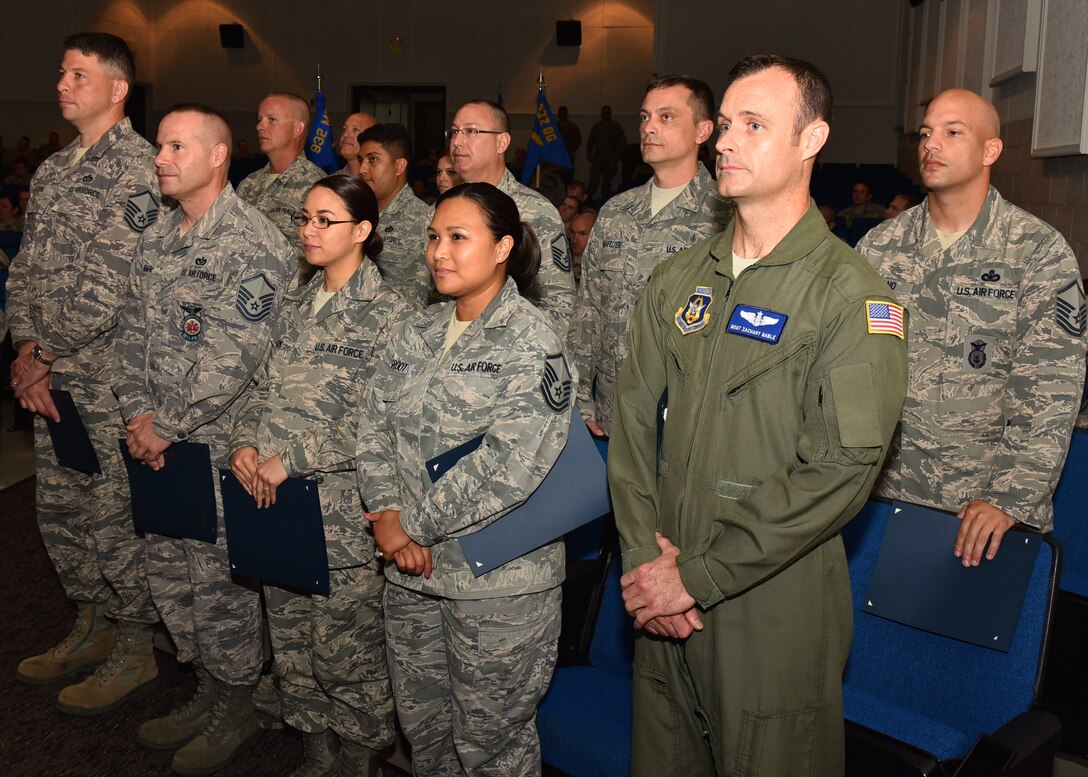 The newest members of the 932nd Airlift Wing's Senior Noncommissioned Officer Corps stand before the unit as they were inducted during a special ceremony on Sunday, June 14, 2015.  (U.S. Air Force photo/Tech. Sgt. Chris Parr)