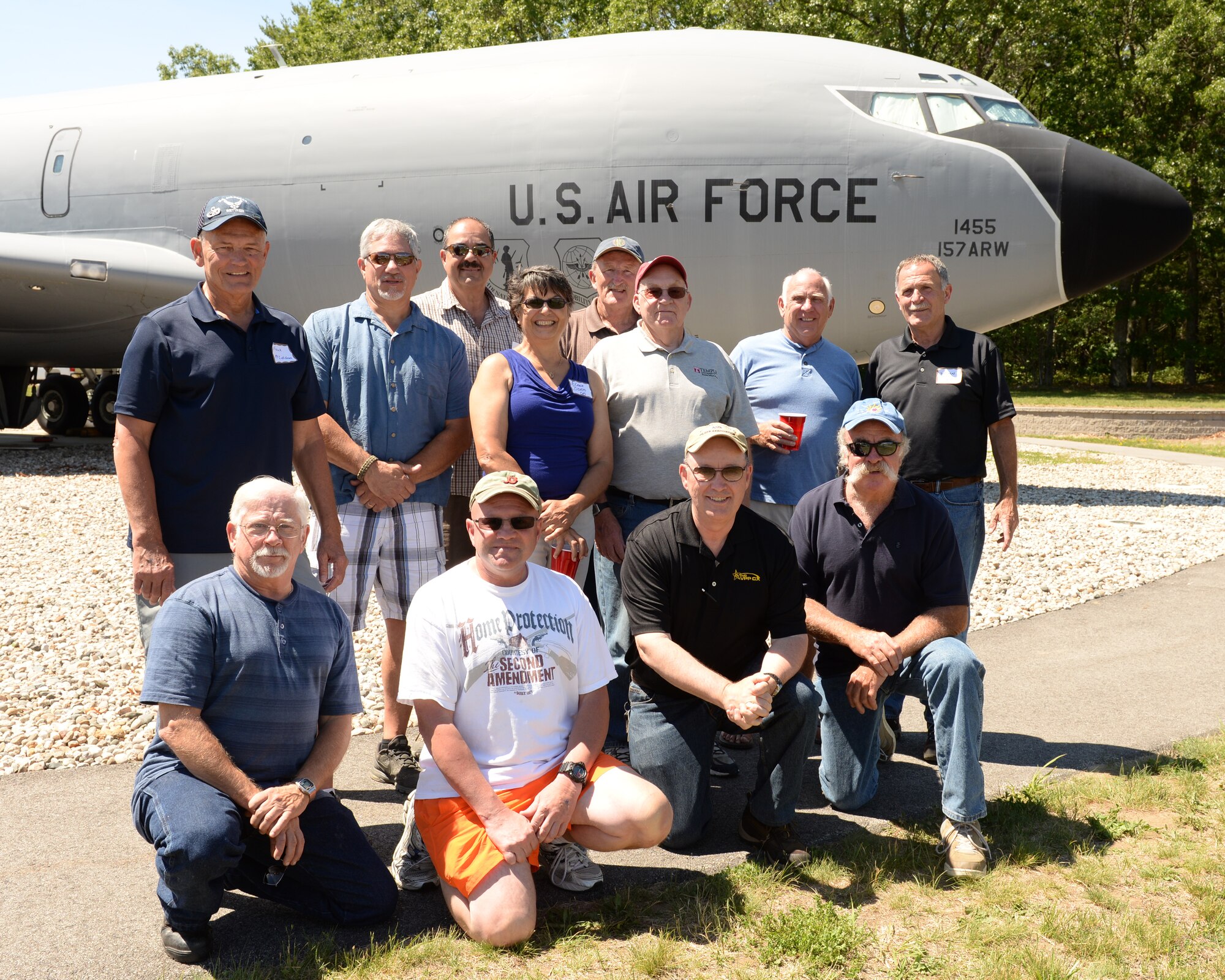 Former aircraft maintenance crew chiefs from the 157th Air Refueling Wing pose for a photograph in front of the KC-135 Stratotanker static display during the Annual Retiree Day on June 17, 2015 at Pease Air National Guard Base, N.H.  (U.S. Air National Guard photo by Staff Sgt. Curtis J. Lenz)