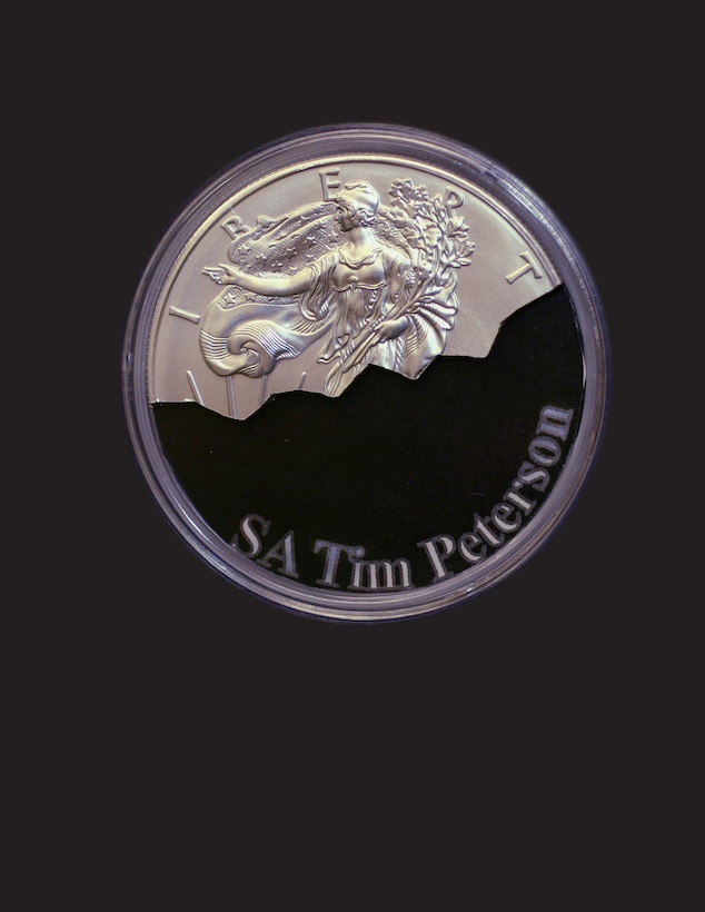 Special Agent Timothy J. Peterson is the first recipient of the Walking Liberty Coin Award in 2015, an honor bestowed during a ceremony held recently at headquarters, A2 Field Support Office, Kirtland AFB, N.M.
