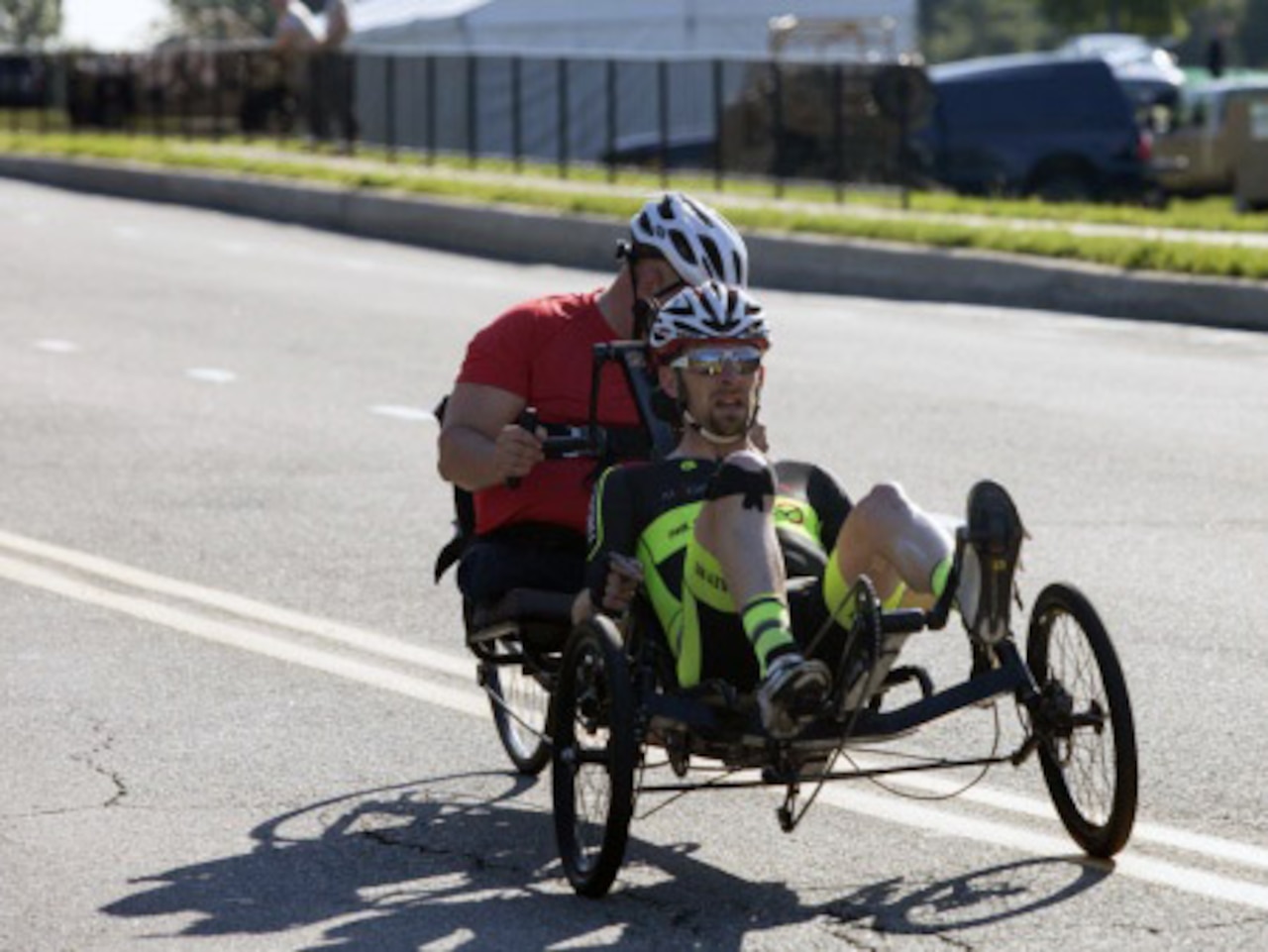 British forces team member retired army Sgt. Andy Perrin and medically retired U.S. Marine Corps Lance Cpl. Chuck Sketch race at the 2015 DoD Warrior Games on Marine Corps Base Quantico, Va., June 21, 2015. Perrin and Sketch earned a gold medal in the men's open recumbent cycling competition. U.S. Marine Corps photo by James Frank