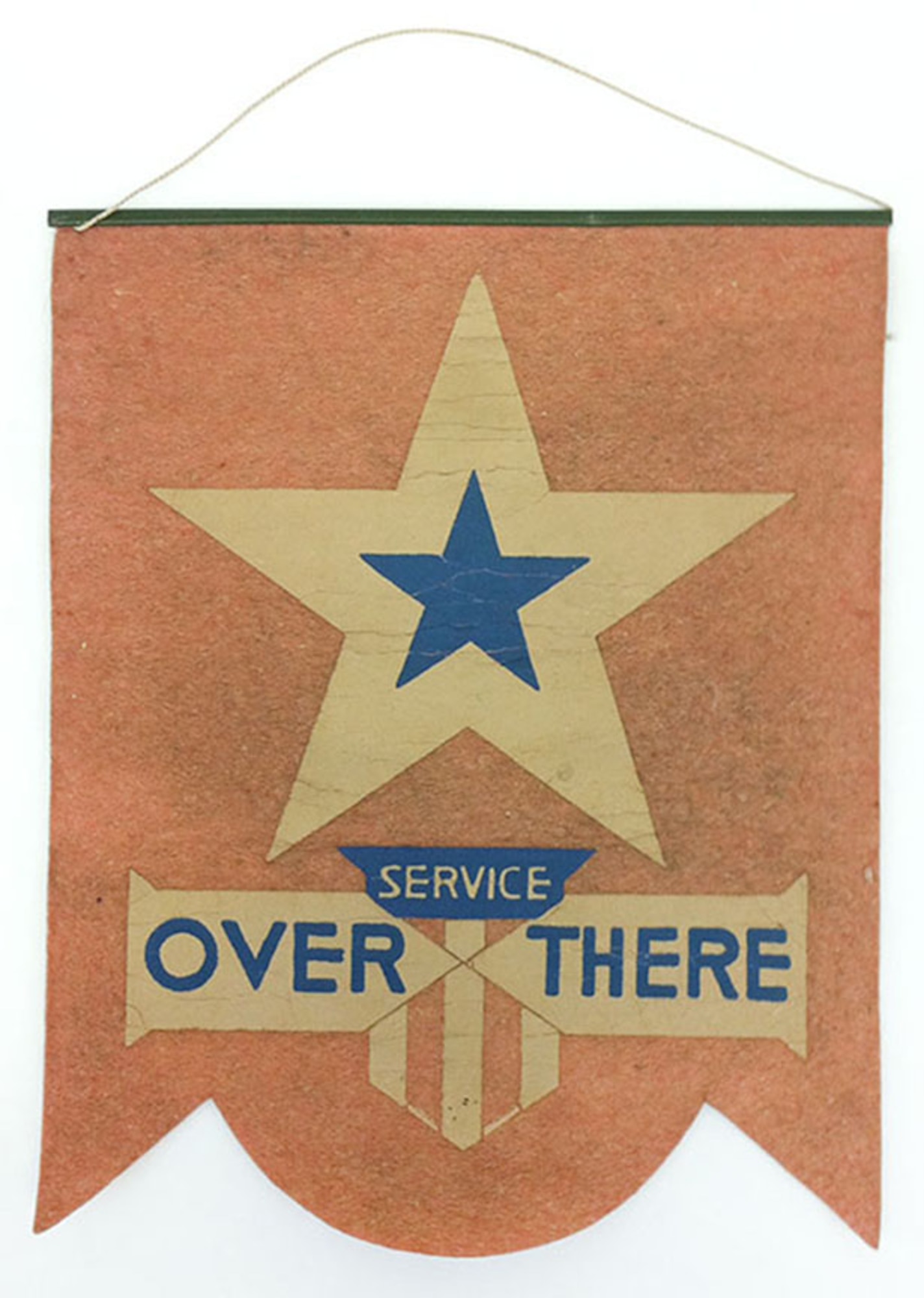 The title to the popular song “Over There,” written by George M. Cohan in April 1917, was incorporated in the designs of some window star flags. This particular 1-star window flag, which reads “Service Over There,” was displayed in the front window of the donor’s grandmother’s home to represent the donor’s father who was serving in Europe during World War I. (U.S. Air Force photo)