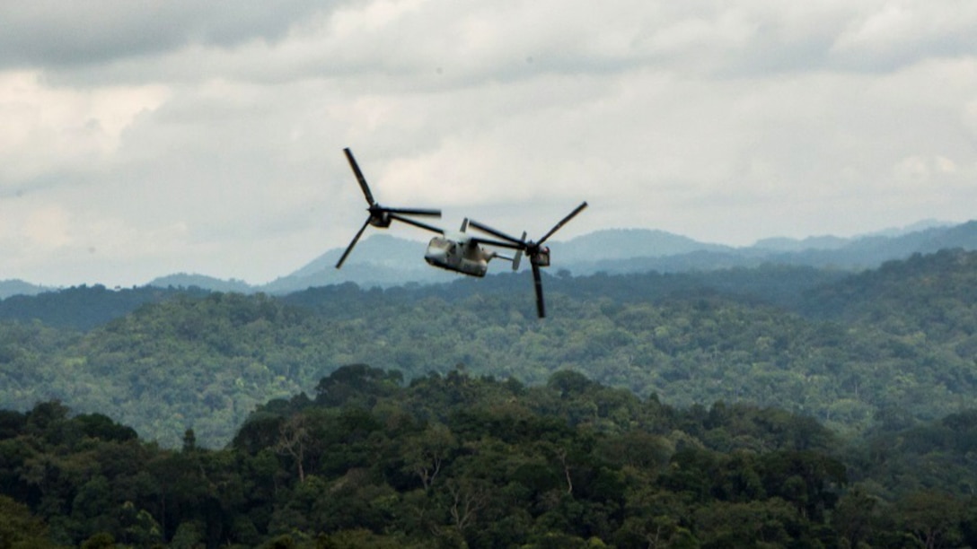 An MV-22 Osprey with Special-Purpose Marine Air-Ground Task Force Crisis Response-Africa conducts a routine flight near Libreville, Gabon, June 16, 2015. The Osprey recently joined two KC-130J Hercules tankers and traveled from Moròn Air Base, Spain, to establish a Cooperative Security Location, similar to a forward-staging base, in order to validate the unit’s capabilities and train with Gabonese forces. (U.S. Marine Corps photograph by Lance Cpl. Christopher Mendoza/Released)