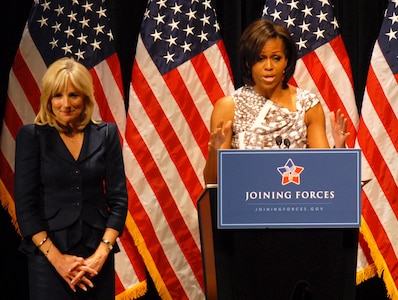 First Lady Michelle Obama speaks about the White House's "Joining Forces" 
military family support campaign to a crowd of National Guard and local 
families as Dr. Jill Biden stands by during a "Joining Forces" community event 
in Columbus, Ohio, April 14, 2011. The event was the final stop on Obama and 
Biden's two-day tour around the nation to spotlight communities doing 
outstanding work to support military families.