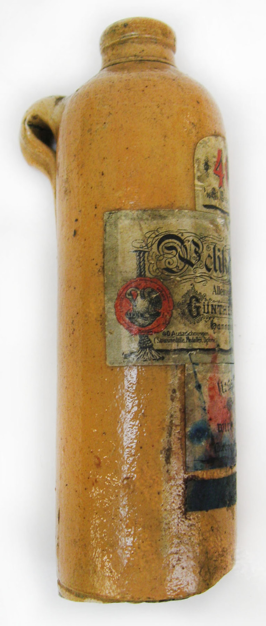 This is a clay ink bottle that once contained blue 4001 ink produced by Pelikan. Around the time of World War I, blue 4001 was the most popular ink color sold by Pelikan. (U.S. Air Force photo)