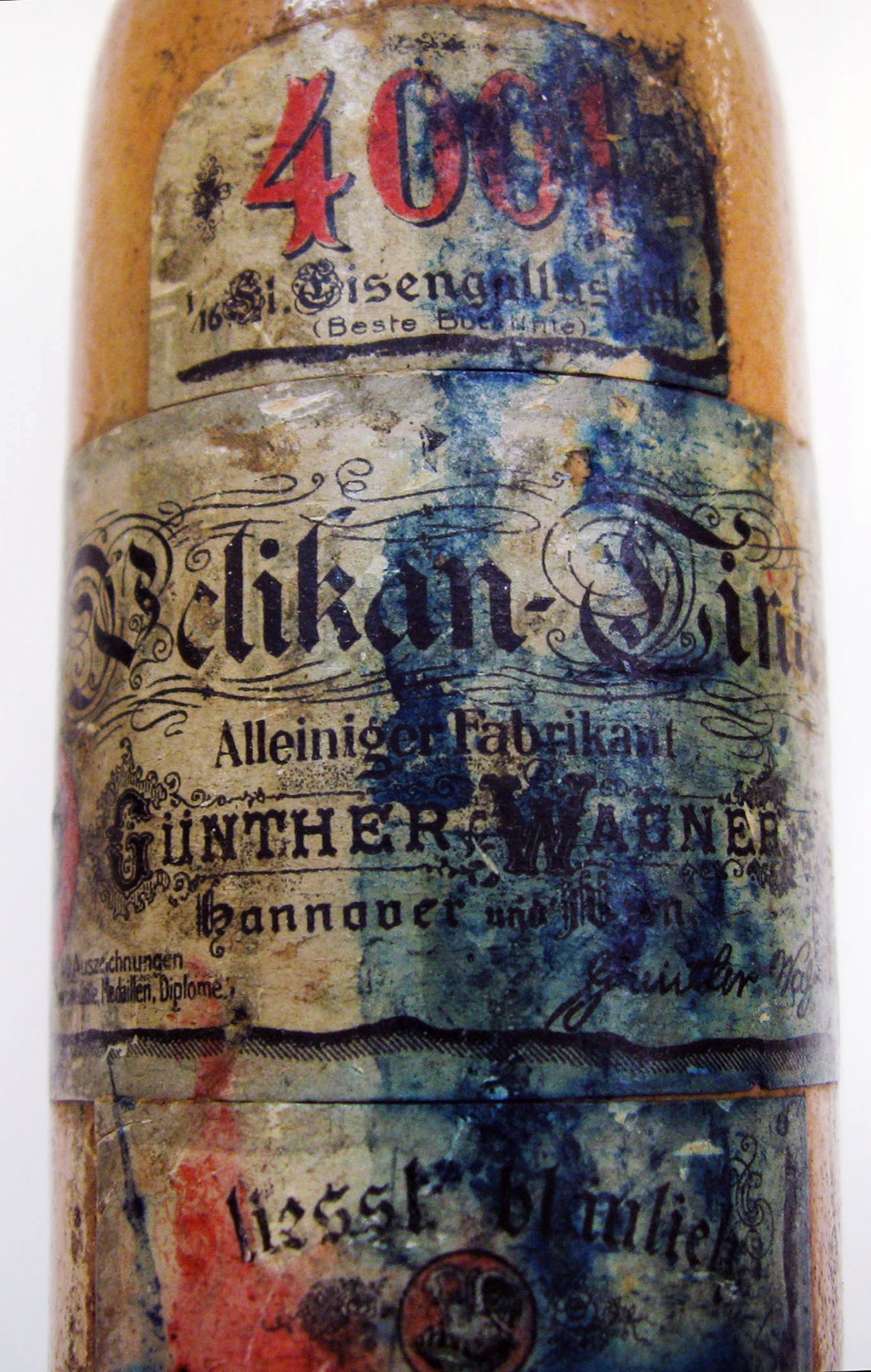This is a clay ink bottle that once contained blue 4001 ink produced by Pelikan. Around the time of World War I, blue 4001 was the most popular ink color sold by Pelikan. (U.S. Air Force photo)