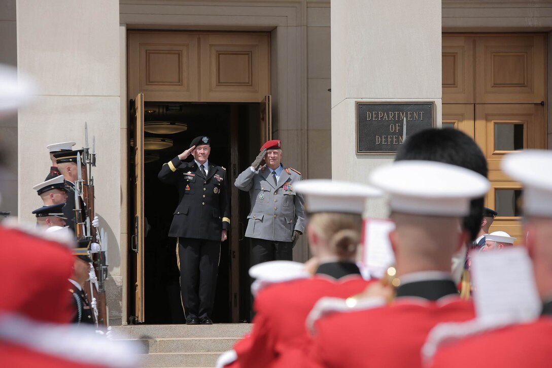 On June 23, 2015, Drum Major Master Sgt. Duane King led the Marine Band in an enhanced cordon ceremony at the Pentagon for Gen. Volker Wieker, the Chief of Defense for the German Armed Forces. (U.S. Marine Corps photo by Master Sgt. Kristin duBois/released.)