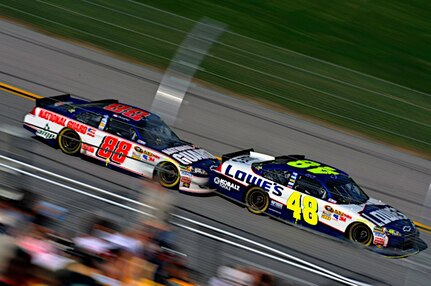 Dale Earnhardt Jr., driver of the No. 88 National Guard racecar, pushes or ‘bump drafts’ teammate Jimmie Johnson during the race at Talladega Superspeedway in Talladega, Ala. April 17, 2011. Earnhardt finished fourth and moved up three positions in the points race.