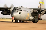 Air Force Master Sgt. Jeff Tschacher, 153rd Aircraft Maintenance Squadron,
Wyoming Air National Guard, directs a C-130H Hercules equipped with the
Modular Airborne Fire fighting System, or MAFFS, to start engine two in
preparation to fight wildfires burning in Texas, April 19, 2011. MAFFS is
capable of dispensing 3,000 gallons of water or fire retardant in less than
five seconds. The wildfires have spread across various parts of Texas and
have burned 1.6 million acres miles of land.