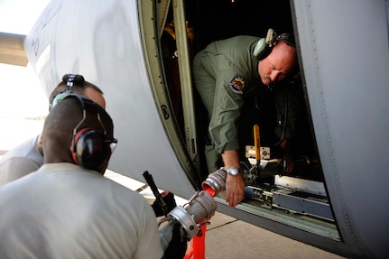 Airmen from the California Air National Guard's 146th Airlift Wing, North
Carolina Air National Guard's 145th Airlift Wing and Wyoming Air National
Guard's 153rd Airlift Wing remove a fire retardant hose from a C-130H
Hercules equipped with the Modular Airborne Firefighting System, or MAFFS,
at Dyess Air Force Base, Texas, April 19, 2011. MAFFS is capable of
dispensing 3,000 gallons of water or fire retardant in less than five
seconds. Wildfires have spread across various parts of Texas and have burned
1.6 million acres miles of land.