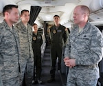 Air Force Command Chief Master Sgt. Christopher Muncy, Air National Guard
Command Chief, talks with crewmembers from the 201st Airlift Squadron during
a visit to District of Columbia Air National Guard, April 17, 2011. The
Chief was invited to talk with the Airmen of 113th at an informal town hall
meeting and also visited work centers around the wing.