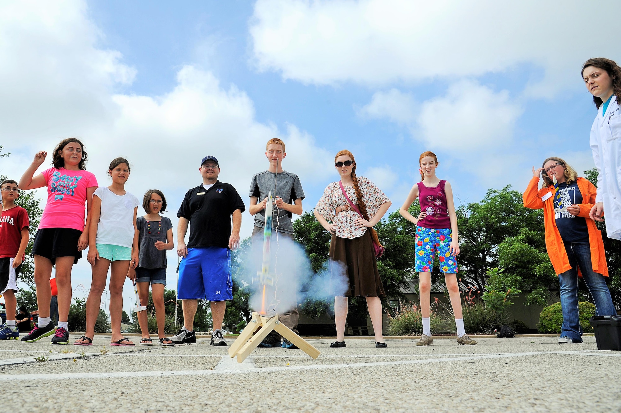 Participants of the 17th Force Support Squadron Youth Programs Science Camp launch a rocket on Goodfellow Air Force Base, Texas, June 19, 2015. Science camp expands and assists U.S. Air Force youths’ understanding of a variety of scientific experiments, discoveries and technologies as lifelong skills and potential career choices. (U.S. Air Force photo by Tech. Sgt. Austin Knox/Released)