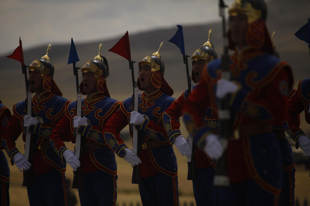 A Mongolian soldier with the Mongolian Armed Forces takes charge of a formation during the opening ceremonies of Exercise Khaan Quest 2015 at Five Hills Training Area in Tavantolgoi, Mongolia, June 15, 2015. Khaan Quest is a regularly scheduled, multinational exercise hosted annually by Mongolian Armed Forces and co-sponsored by U.S. Army, Pacific, and U.S. Marine Corps Forces, Pacific. KQ15 is the latest in a continuing series of exercises designed to promote regional peace and security. This year marks the 13th iteration of this training event.