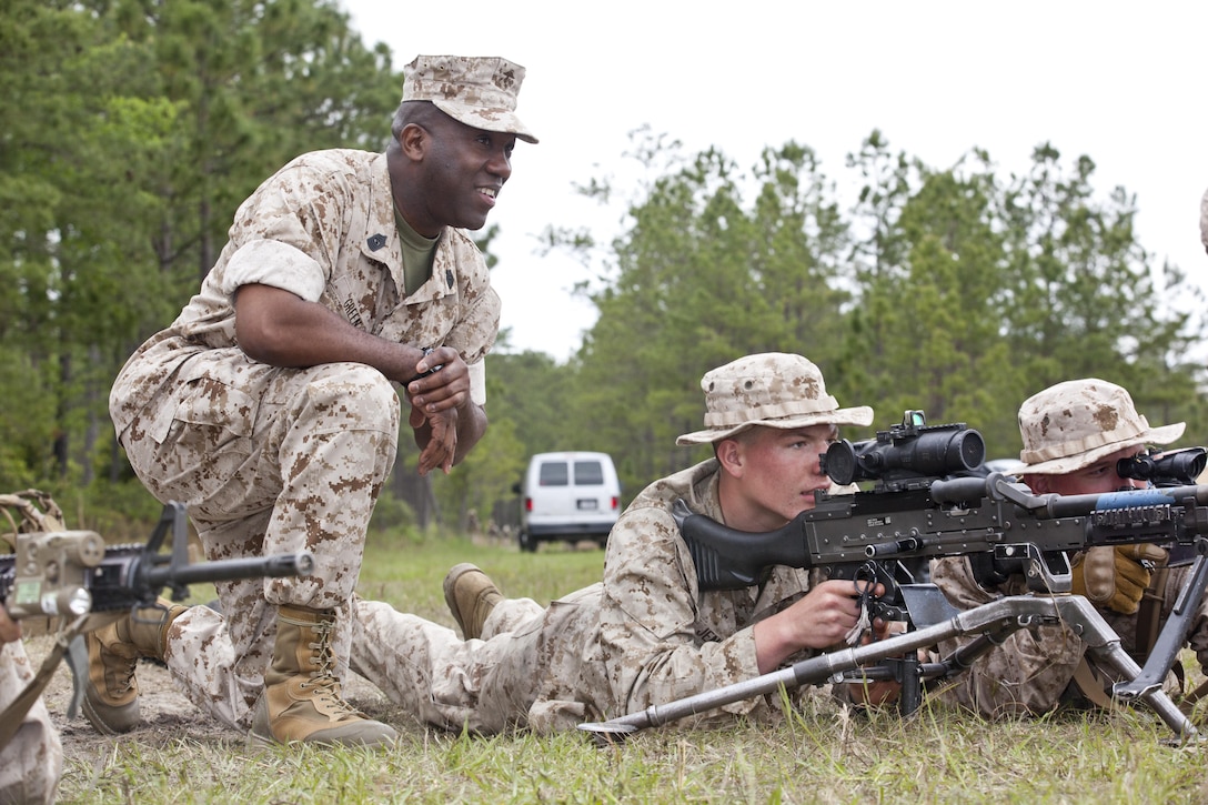 Sgt. Maj. of the Marine Corps Ronald L. Green, observes Marines with 2nd Battalion, 2nd Marines, training at Camp Lejeune, N.C., April 29, 2015. Green and Commandant of the Marine Corps Gen. Joseph F. Dunford, Jr., met with Marines during their II Marine Expeditionary Force visit. (U.S. Marine Corps photo by Sgt. Gabriela Garcia/Released)