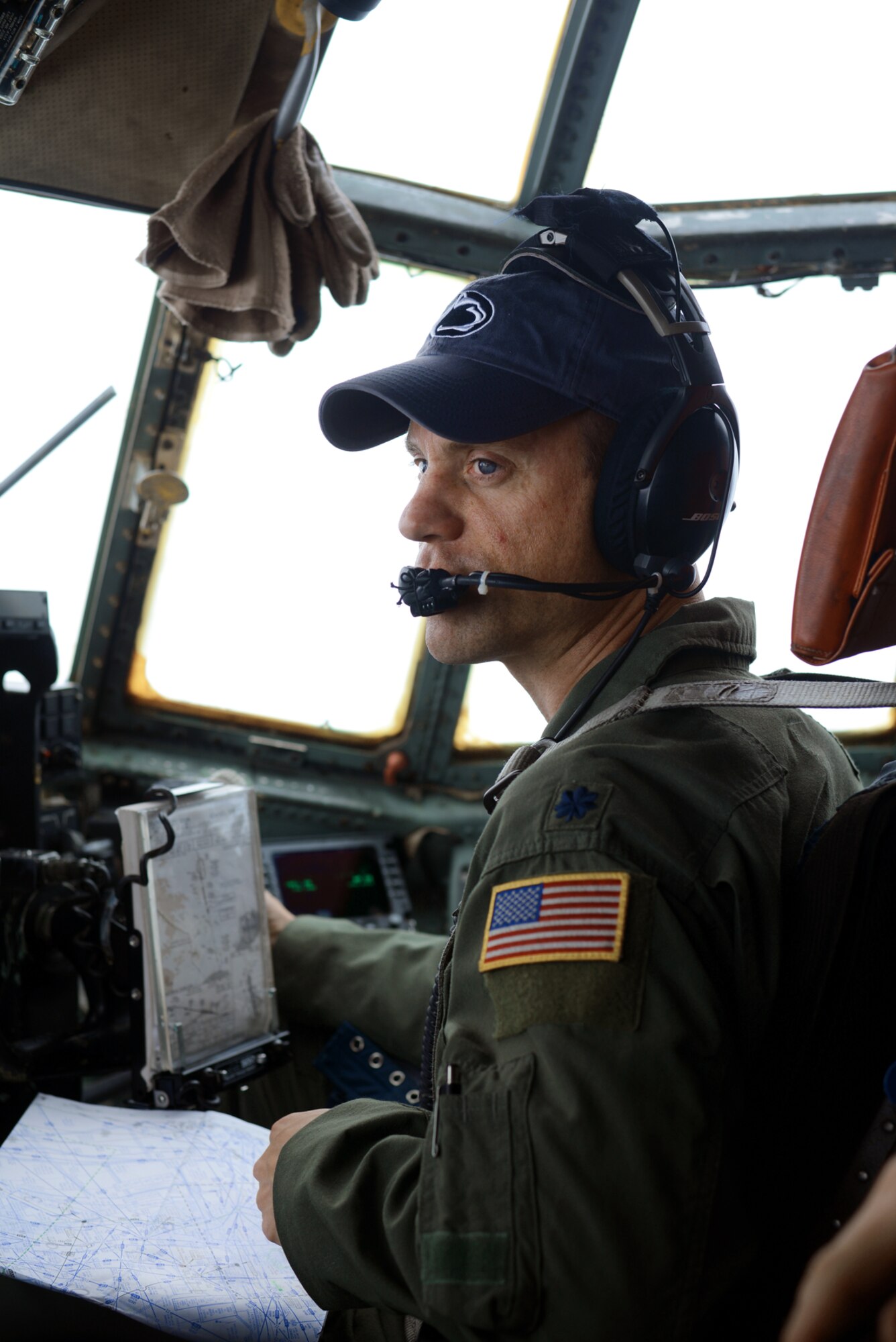 Lt. Col. John R. Kerr, 36th Airlift Squadron director of operations, pilots a C-130 Hercules during a training exercise, June 19, 2015. The flight tested the capabilities of a new drop zone courtesy of Misawa Air Base, Japan. 