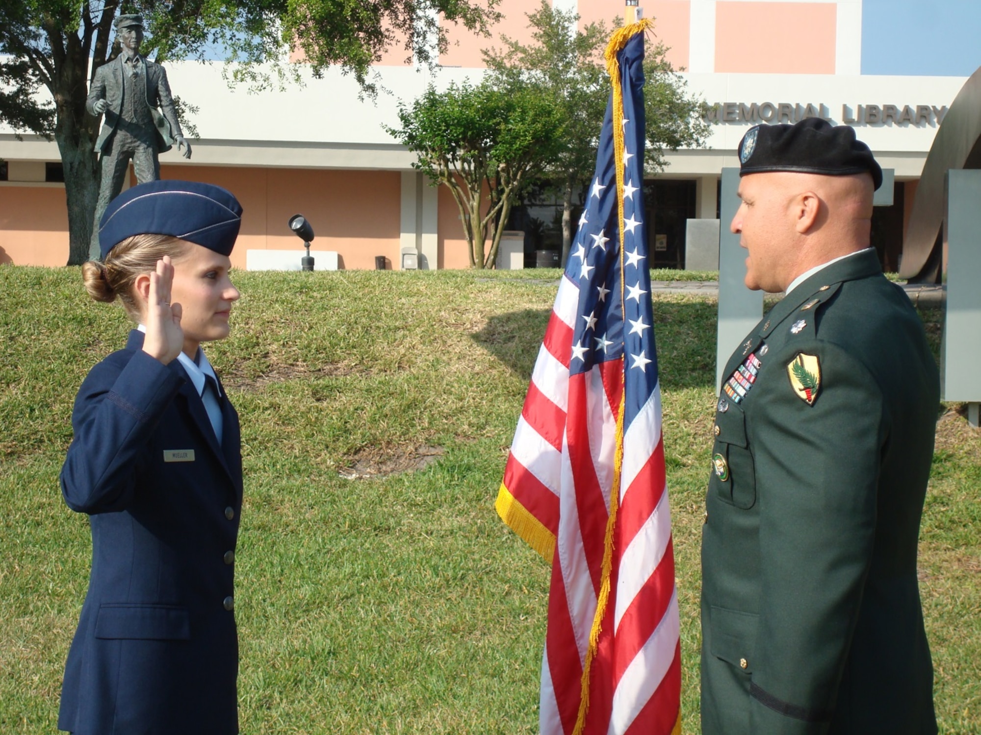 Then Cadet Sandra Mueller takes the Oath of Commission May 2008 at Embry Riddle Aeronautical University, Daytona Beach, Fla. Mueller joined the Air Force after moving to the U.S. and becoming a U.S. citizen. (Courtesy photo /Released)