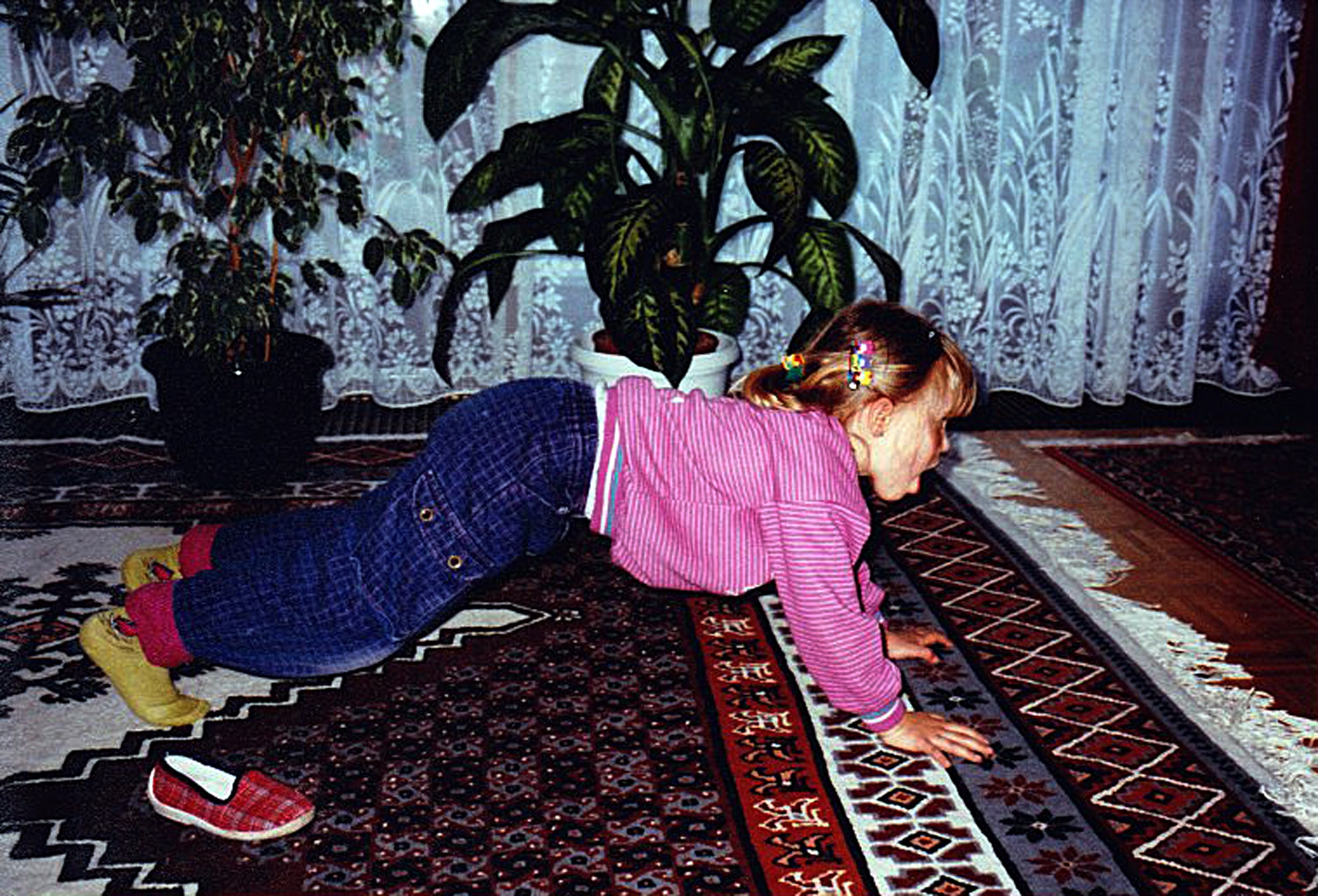 A young Sandra Mueller practices pushups in her house in Langenfeld, Germany. After visiting the U.S. as a child, Sandra began to pursue a dream of living in the U.S. and joining the Air Force.  (Courtesy photo /Released)