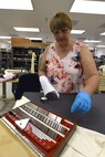 Candice Brown, 341st Maintenance Operation Squadron Precision Measurement Equipment Laboratory technician, uses a gauge block for linear measurements June 23, 2015, at Malmstrom Air Force Base, Mont.  The average week of work orders vary but the PMEL shop averages more than 300 a month and more than 4,000 requests every six months. (U.S. Air Force photo/Chris Willis)