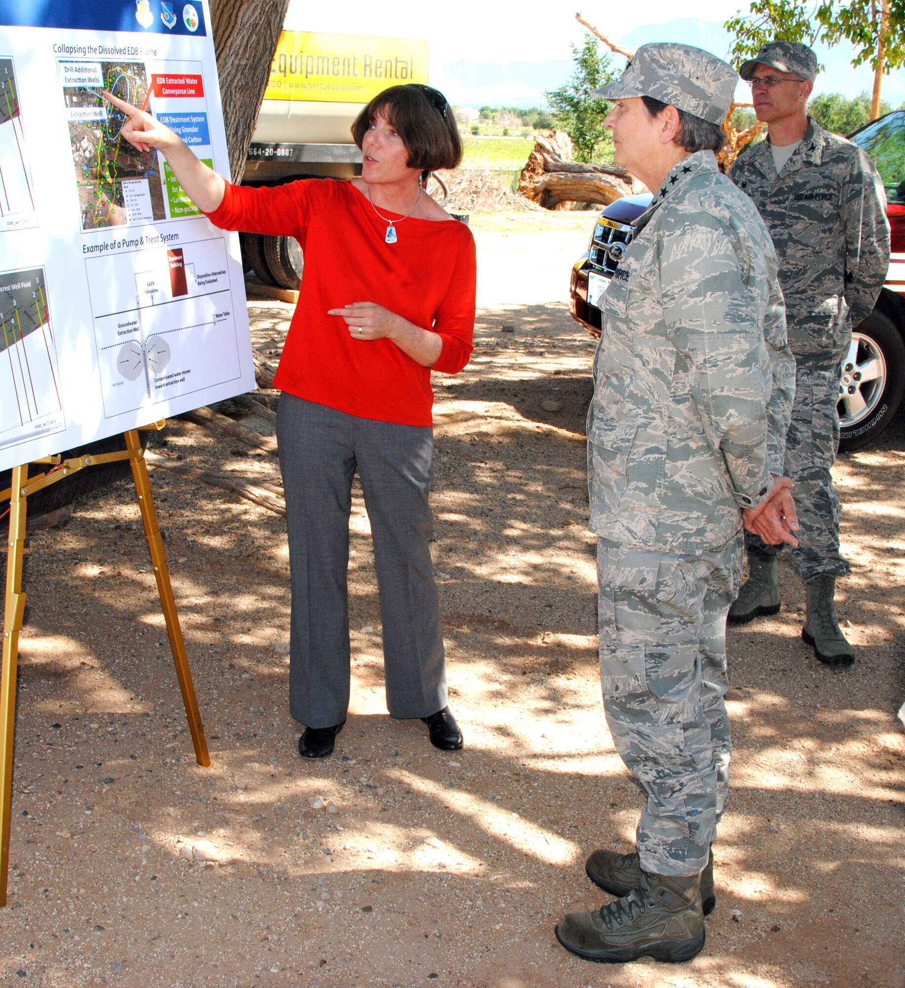 Dr. Adria Bodour, Air Force Civil Engineer Center and chief scientist for the Bulk Fuels Facility cleanup project (left), details the pump and treat phase of the cleanup for Gen. Ellen Pawlikowski, Air Force Materiel Command commander June 17. Pawlikowski toured the Pump and Treat facility as part of a two-day visit to Kirtland June 17 and 18. (Photo by Jim Fisher)
