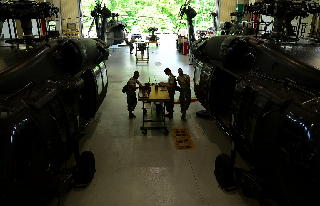U.S. Army 128th Aviation Brigade Advanced Individual Training students, set up tools and equipment at Fort Eustis, Va., June 18, 2015. All AIT students must organize their work place before each day’s assignments in order to track equipment and tasks. (U.S. Air Force photo by Senior Airman Kimberly Nagle/Released)