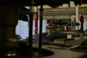 U.S. Army Pvt. Nikkolaus Carr, 128th Aviation Brigade Advanced Individual Training student, works on a UH-60 Blackhawk’s main rotor hub at Fort Eustis, Va., June 18, 2015. Carr was connecting a scissor link, which connects two plates together enabling the aircraft’s blades to rotate.  (U.S. Air Force photo by Staff Sgt. Natasha Stannard/Released)